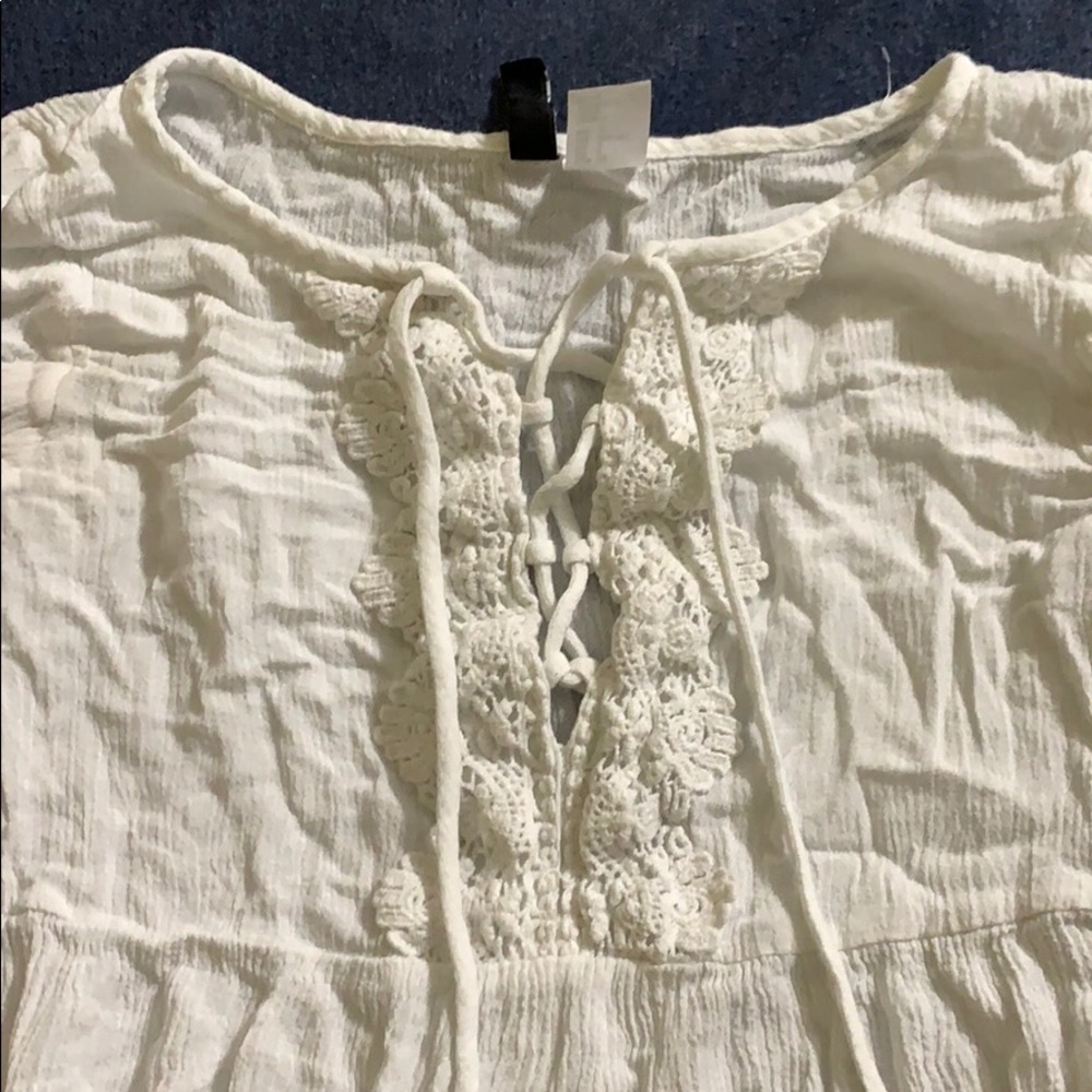 White flowy blouse with lace detail